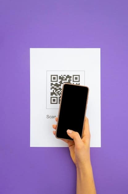 A hand hovering over two QR codes, one labelled 