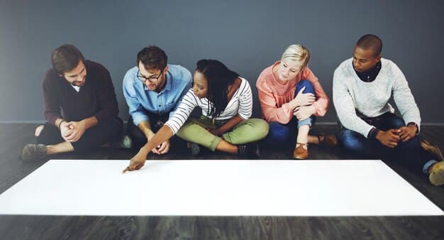 A diverse team sitting around a table, brainstorming ideas and sketching on a whiteboard, with sticky notes and diagrams covering the surface, illustrating a dynamic and collaborative session focused on problem-solving and innovation within a fintech startup.