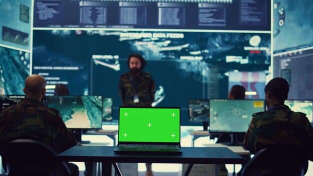 A group of employees participating in a cybersecurity training session, with a screen displaying examples of phishing emails and security best practices. The image emphasizes the importance of human awareness in preventing cyberattacks.